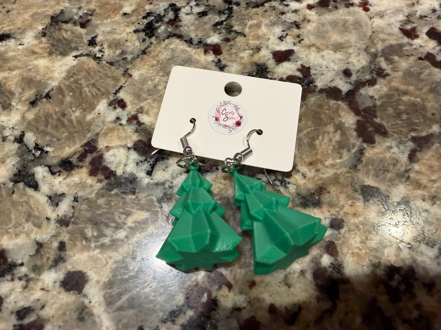 Holiday/winter earrings! Available in four designs: Christmas tree, snowflake, hot cocoa, and Santa!