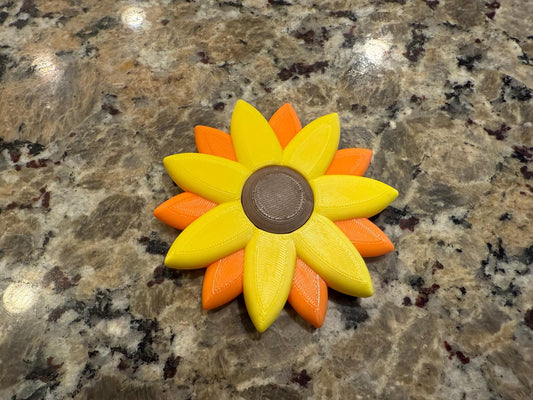 Sunflower fidget spinner! Center portion rotates, fun to play with. Can entertain for hours!