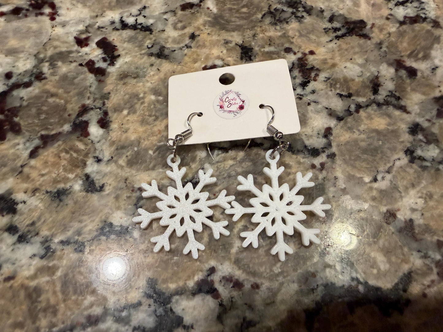 Holiday/winter earrings! Available in four designs: Christmas tree, snowflake, hot cocoa, and Santa!