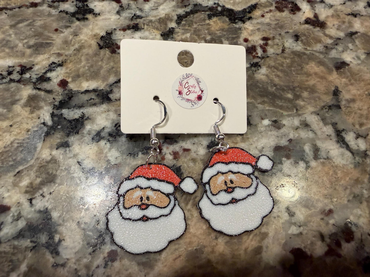 Holiday/winter earrings! Available in four designs: Christmas tree, snowflake, hot cocoa, and Santa!