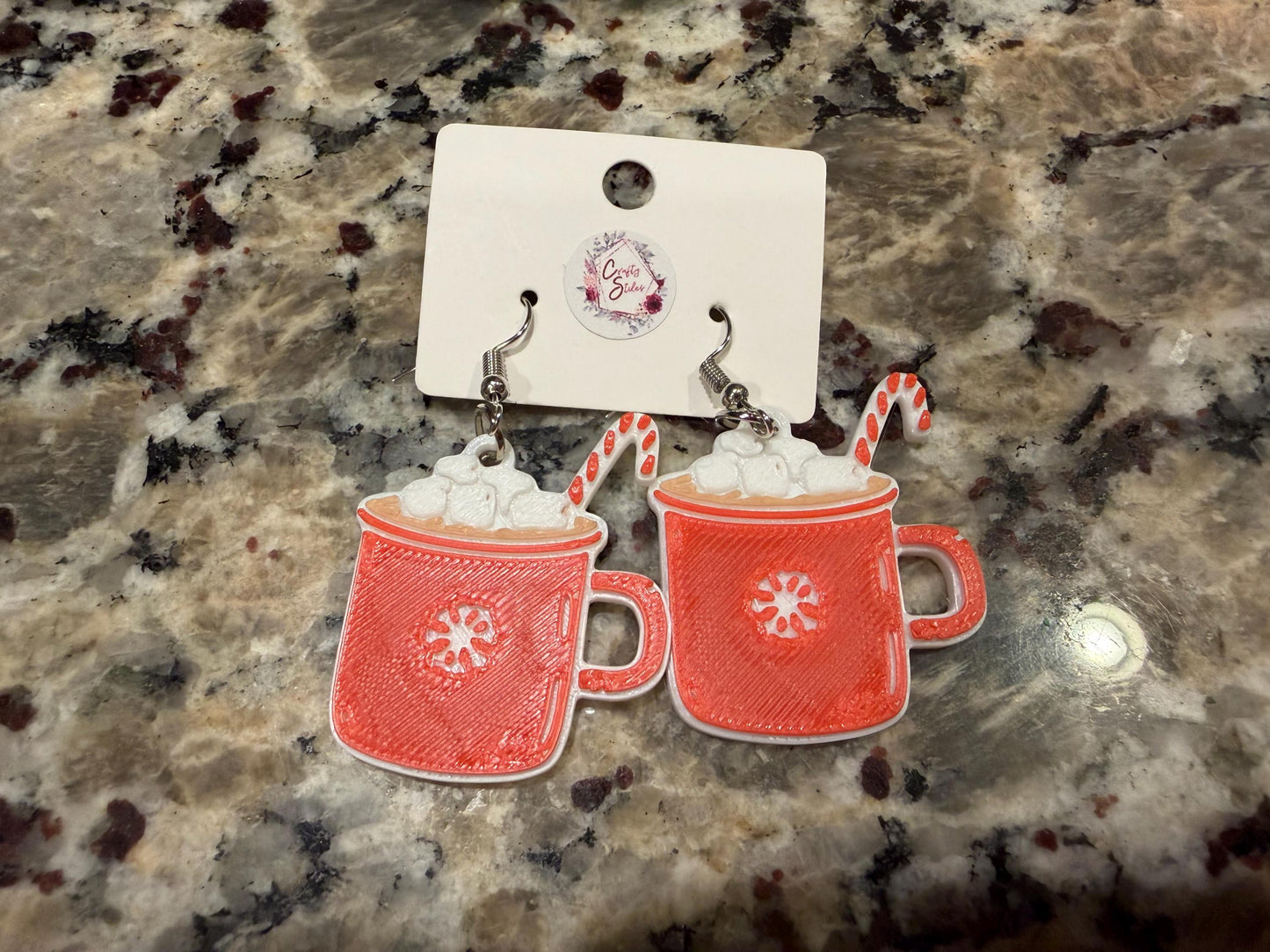 Holiday/winter earrings! Available in four designs: Christmas tree, snowflake, hot cocoa, and Santa!