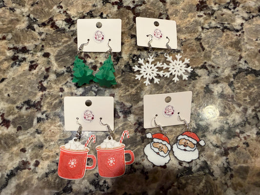 Holiday/winter earrings! Available in four designs: Christmas tree, snowflake, hot cocoa, and Santa!
