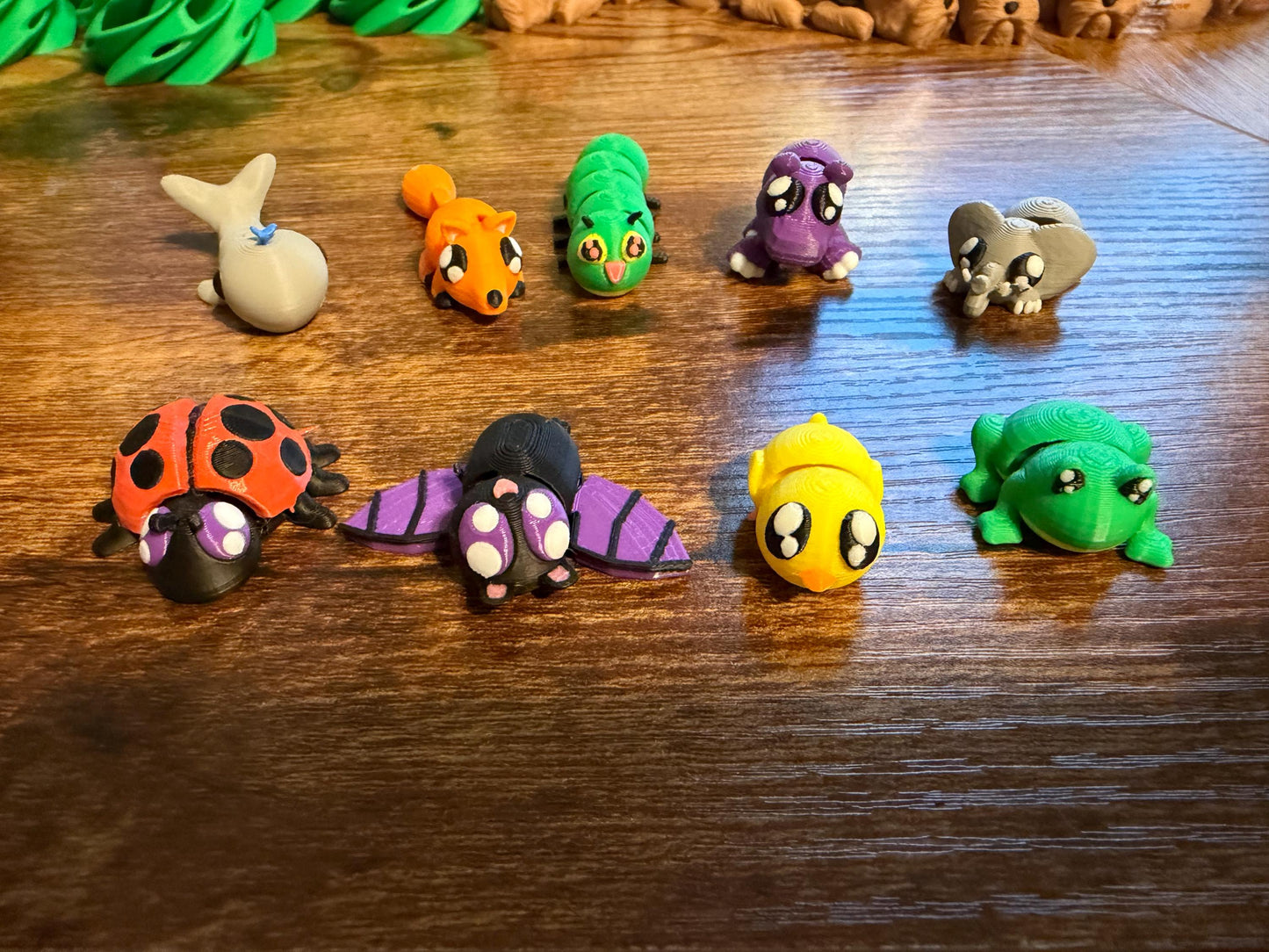 Flexi 3d printed mini animals, collect them all! Bat, caterpillar, chick, elephant, fox, frog, hippo, lady bug, whale!